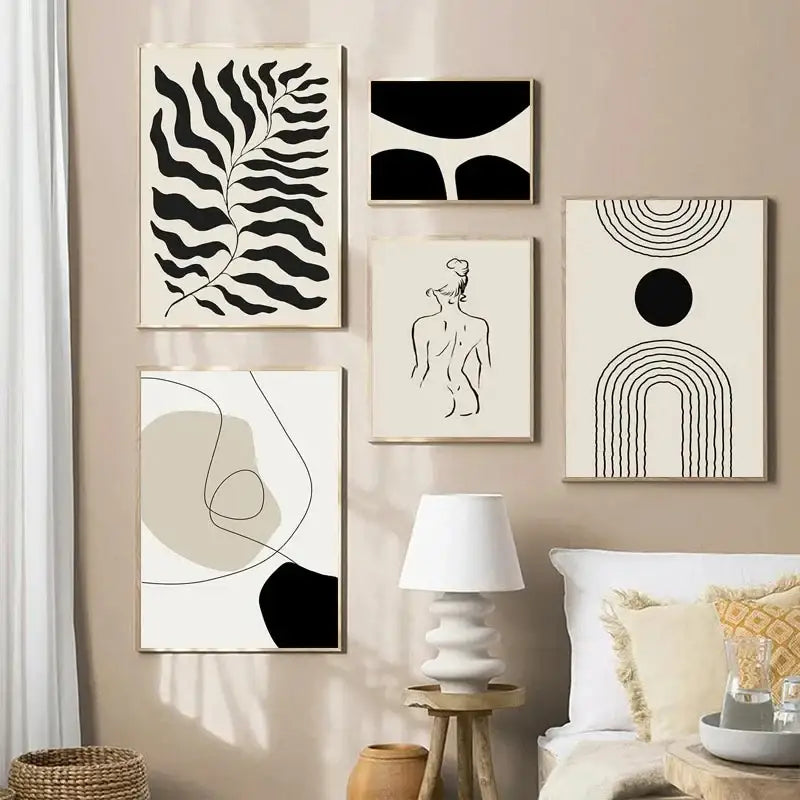 Set of five minimalist boho canvas art prints featuring geometric leaf rainbow designs in black white and beige tones