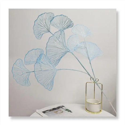 Delicate light blue ginkgo leaf branch artificial flowers in a gold-toned geometric vase by DecorBites Ginkgo Leaf