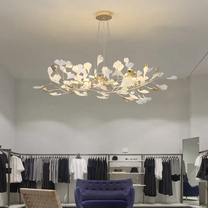 Elegant white and gold leaf-shaped decorbites ginkgo leaf chandelier with delicate branching design for luxury interiors