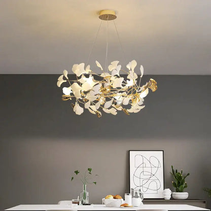 Decorbites ginkgo leaf chandelier with white and gold leaf elements and brass fixture for elegant nordic luxury lighting