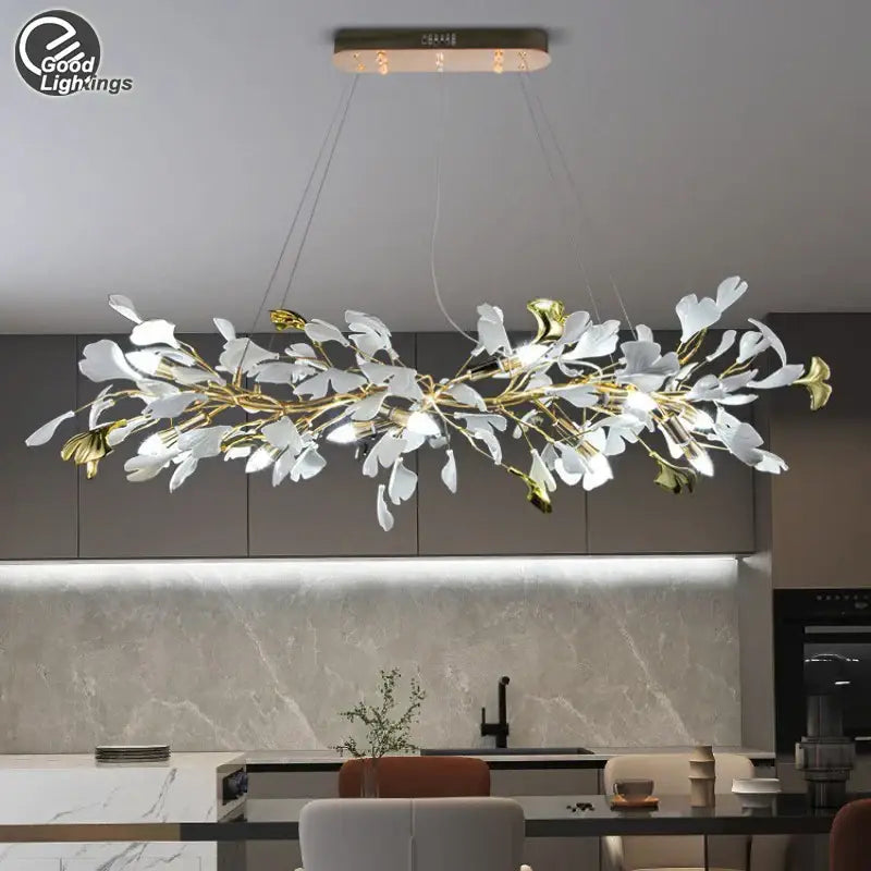 Elegant white and gold ginkgo leaf crystal chandelier by DecorBites featuring a modern branch-like pendant light design