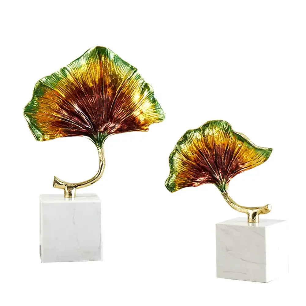 Decorbites ginkgo leaf metal sculpture featuring two green to gold gradient leaves on white marble bases for home decor