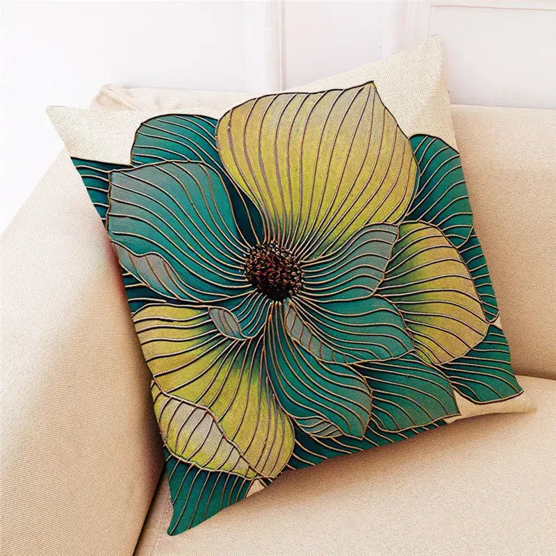 Beige linen cushion cover with vibrant stylized ginkgo leaves in gradient green and yellow by decorbites ginkgo leaves