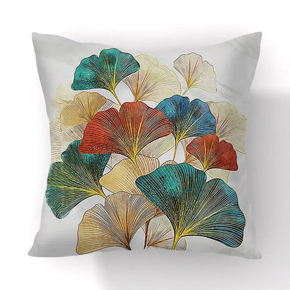 Square throw pillow with decorbites ginkgo leaves print in teal red gold on light gray for sofa or chair cover