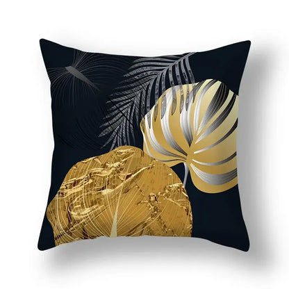 Black decorbites ginkgo leaves throw pillow featuring bold metallic gold and silver leaves print sofa design 45x45cm