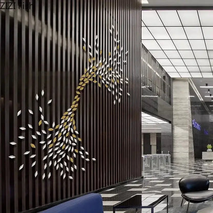A modern decorbites ginkgo leaves wall decor featuring metallic gold and silver leaf accents on dark wooden slats wall decor