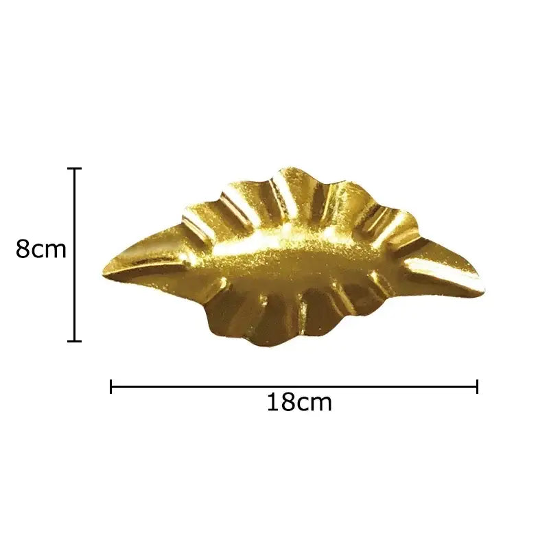Golden metallic leaf-shaped decorative tray with scalloped edges from decorbites wall hanging ornaments collection