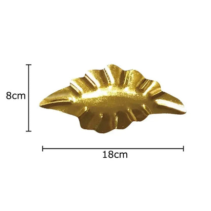 Golden metallic leaf-shaped decorative tray with scalloped edges from decorbites wall hanging ornaments collection