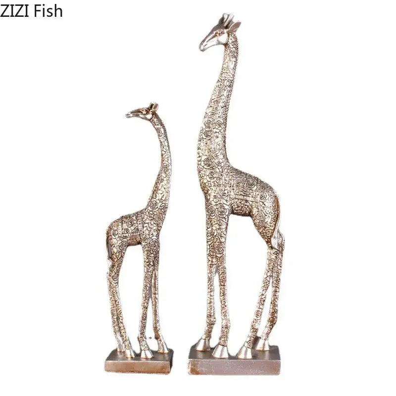 Silver-toned giraffe resin statue ornament with intricate floral embossing on rectangular bases for desk decor