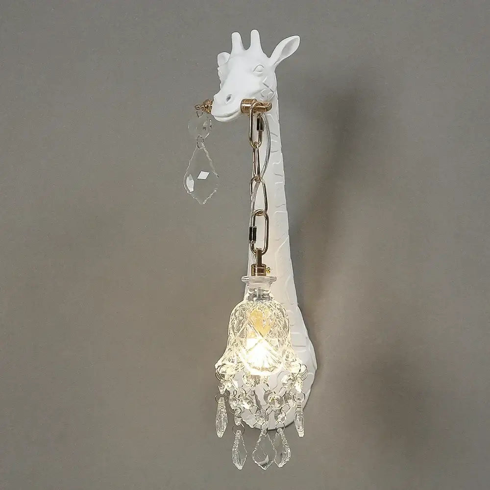 White DecorBites giraffe resin wall lamp sconce with crystal pendant and dangling crystals for bedside decor