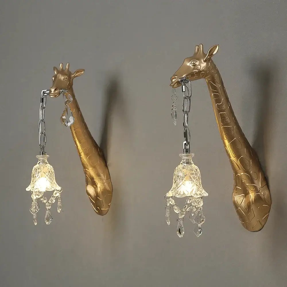 Golden giraffe resin wall lamp sconces with crystal chandeliers hanging from chains by decorbites for bedside decor