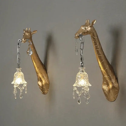 Golden giraffe resin wall lamp sconces with crystal chandeliers hanging from chains by decorbites for bedside decor