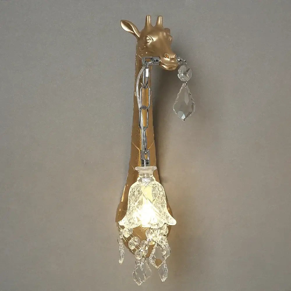 Gold-toned decorbites giraffe resin wall lamp with crystal accents and bell-shaped glass shade for bedside and living room decor