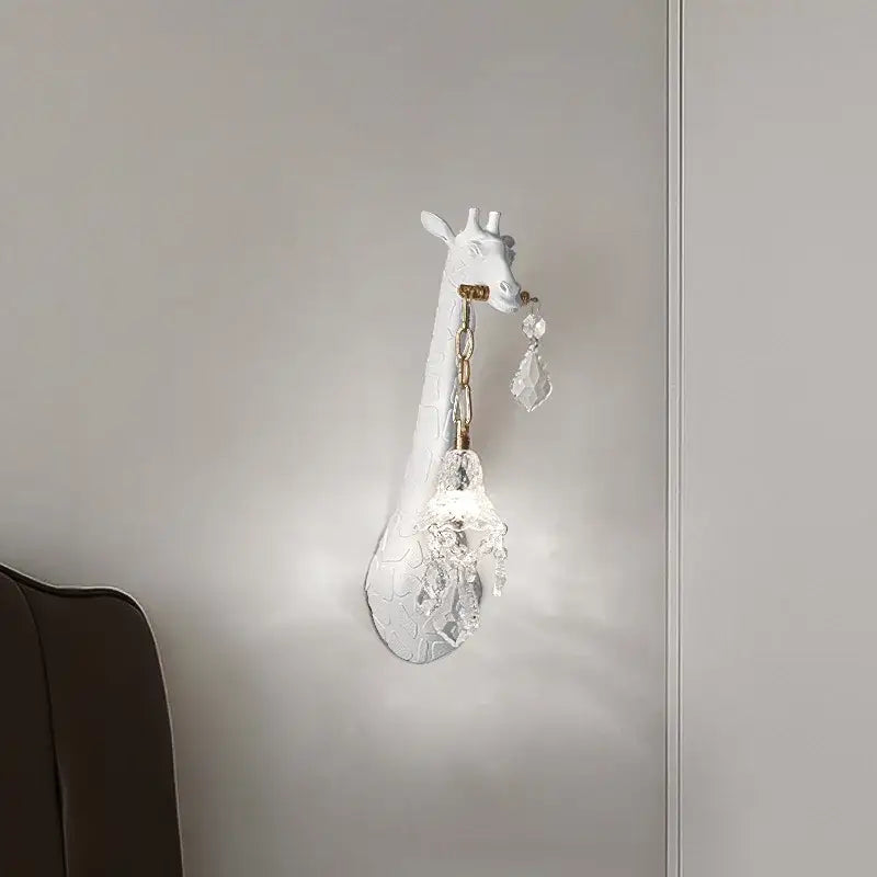 White giraffe resin wall lamp sconce with crystal accents and gold chain by decorbites for bedside and living room decor