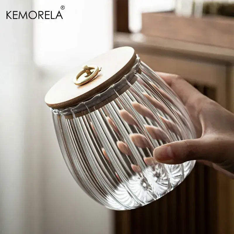 Clear glass airtight canister with vertical ridges wooden lid and brass handle by kemorela in decorbites glass airtight collection
