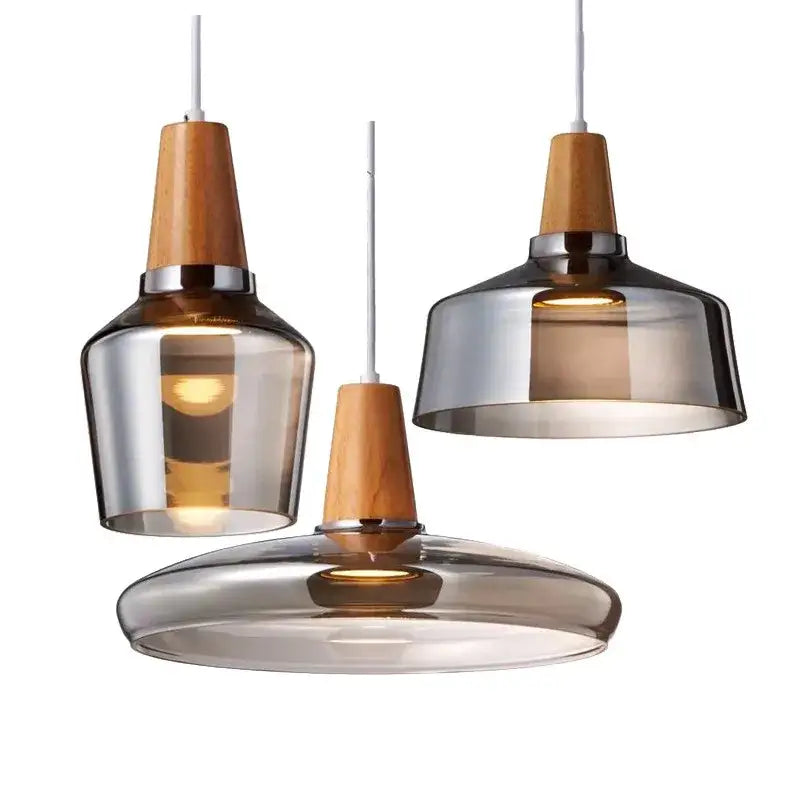 Three modern decorbites glass and wood pendant lights with smoked glass shades for retro dining loft decor