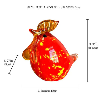 Vibrant red glass animal figurine with golden-yellow speckles and amber wings from decorbites glass animal figurines collection