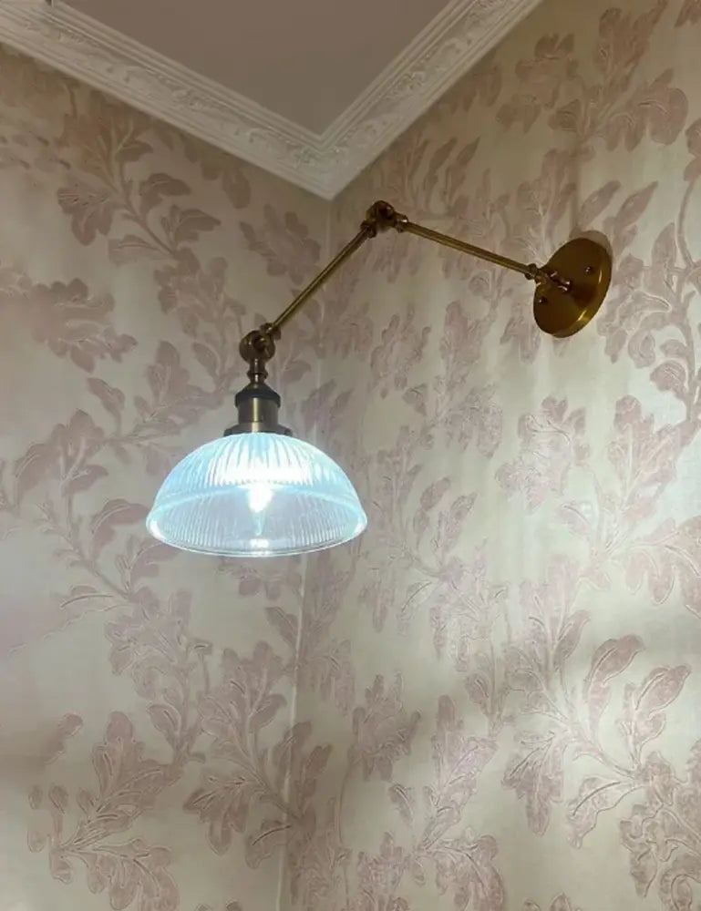 Vintage-style brass decorbites glass arm wall lamp with ribbed translucent blue glass shade black gold finish