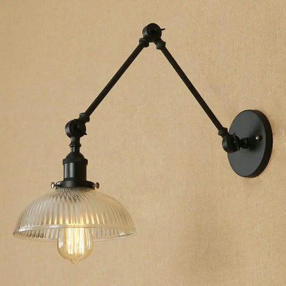 Black wrought iron decorbites glass arm wall lamp with ribbed glass shade and exposed filament bulb vintage style