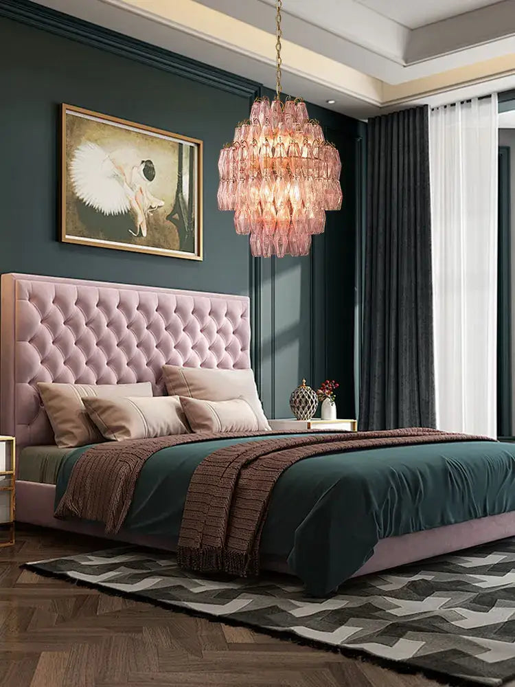 Pink tufted velvet headboard with plush texture and button detailing in decorbites glass art led chandelier setup