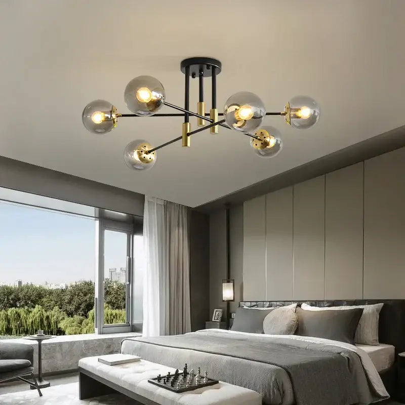 Modern black and brass decorbites glass ball chandelier with clear glass globe bulbs for nordic round dining table lighting