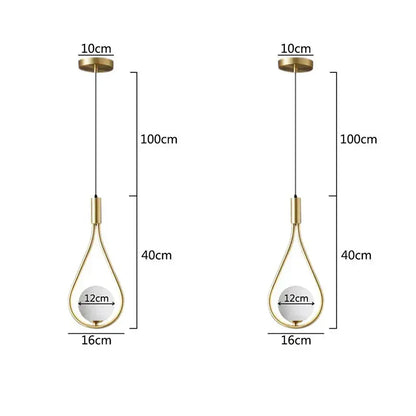 Gold-toned decorbites glass ball wall lamp featuring a teardrop brass pendant with a white spherical glass globe