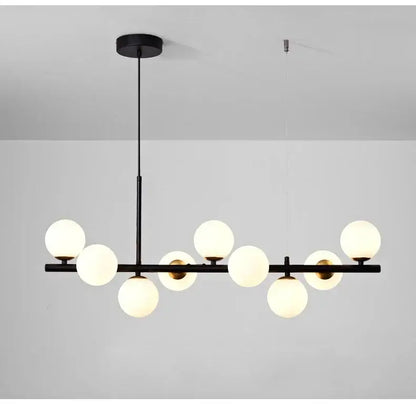 Black DecorBites™ glass ball ceiling chandelier with nine frosted glass globe lights for dining room use