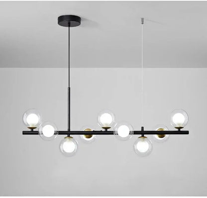 Decorbites™ black metal ball ceiling chandelier with clear glass ball bulbs and gold-toned accents for dining room