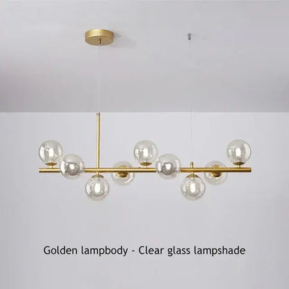Golden DecorBites™ ball ceiling chandelier with clear glass globe shades and sleek brass frame for home lighting