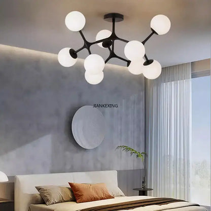 Modern black metal DecorBites glass ball ceiling chandelier with multiple white spherical glass globes for living room