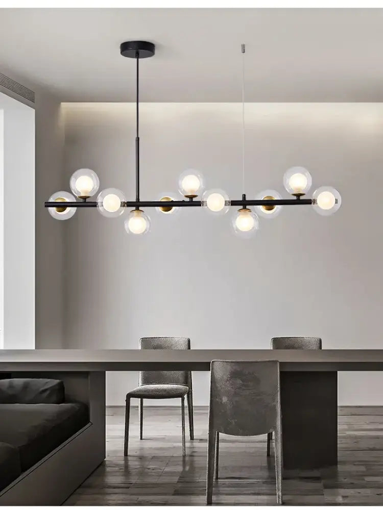 Modern black metal DecorBites™ glass ball chandelier with spherical glass globe bulbs for dining room lighting
