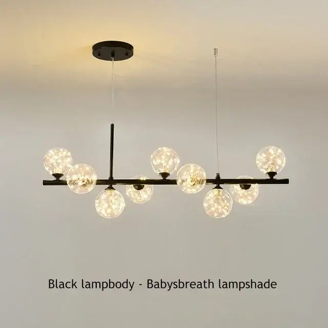 Black metal DecorBites™ glass ball chandelier with multiple frosted spherical glass shades resembling babys breath
