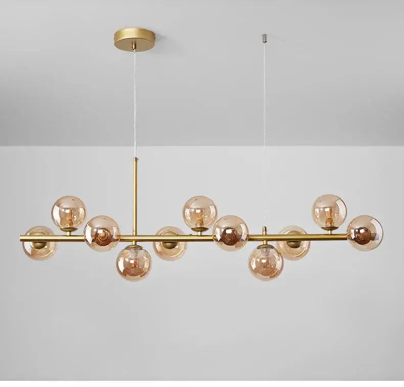 Decorbites™ glass ball chandelier with gold-toned metal and amber glass globe bulbs for modern home lighting