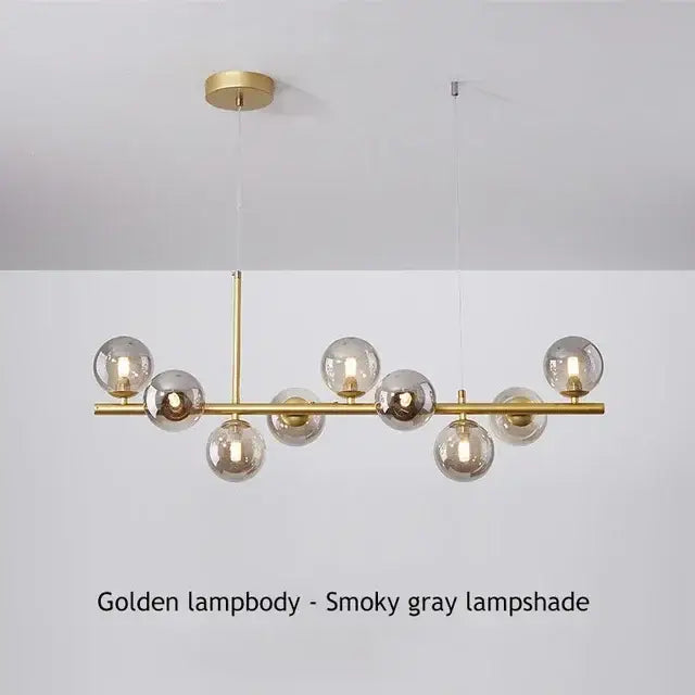 DecorBites™ glass ball chandelier with smoky gray glass globe shades and polished brass frame for modern home lighting