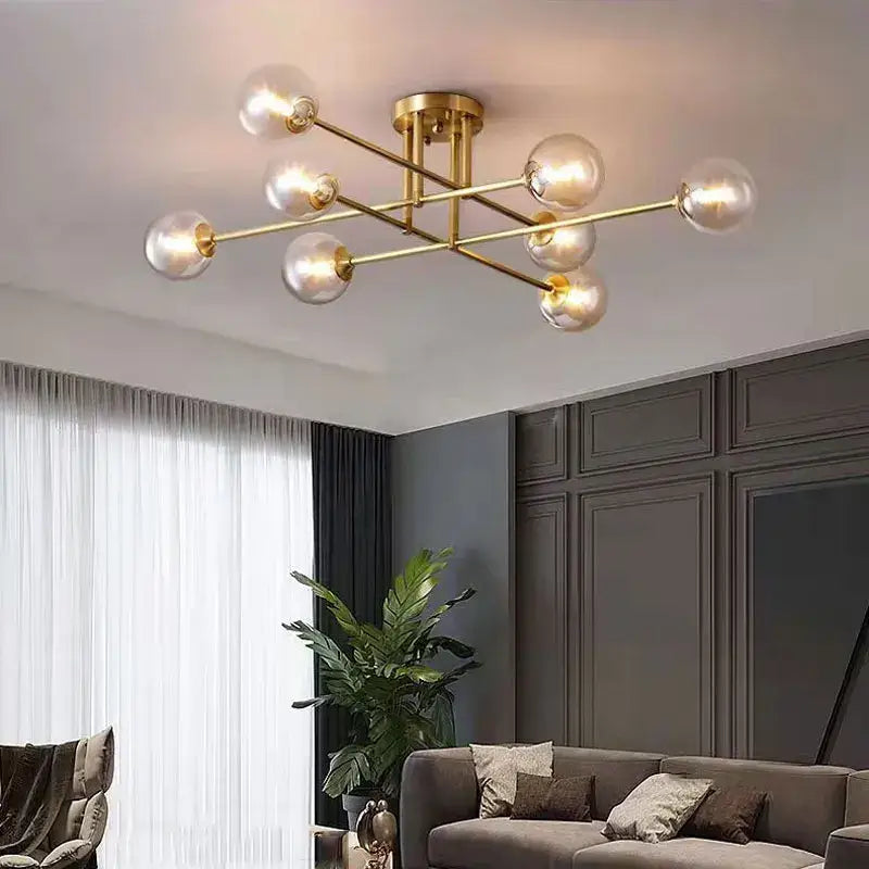 Modern brass DecorBites glass ball chandelier with clear glass globe bulbs for living room bedroom and study use