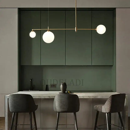 Modern minimalist decorbites glass ball pendant light fixture with frosted glass bulbs and brass rod for dining room use