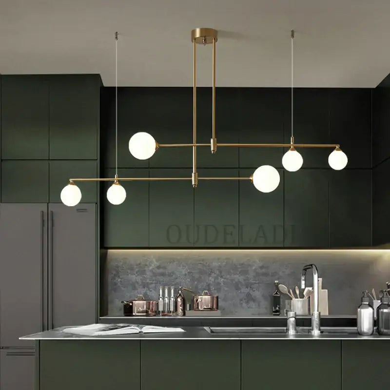 Modern brass pendant light fixture with five white glass bulbs by decorbites glass ball for dining room use