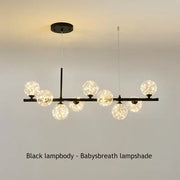 Decorbites™ glass ball chandelier is a black metal lighting fixture with frosted spherical glass ball shades resembling baby’s breath