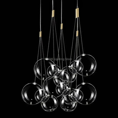 Modern decorbites glass ball chandelier with clear spherical bulbs and gold-toned metal accents for home decor