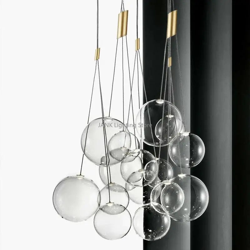 DecorBites glass ball chandelier with gold-toned metal accents and clear glass spheres for modern home decor