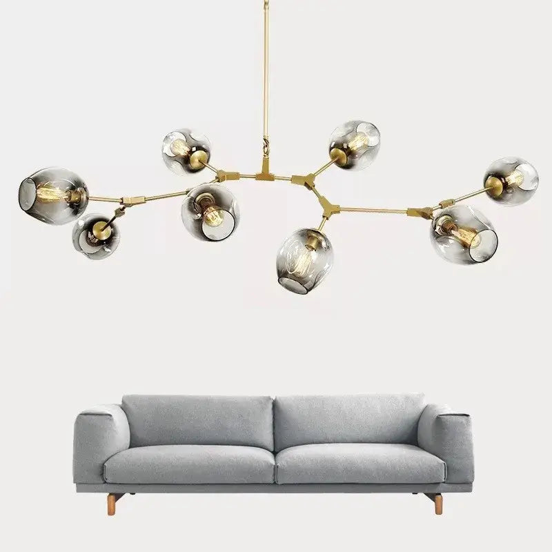 Modern brass decorbites™ glass ball led chandelier with smoked glass globe shades and exposed filament bulbs