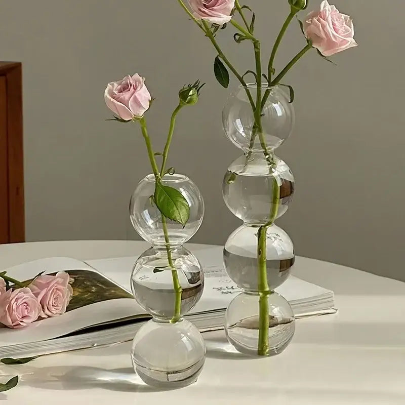 Decorbites™ glass bubble hydroponic vase with clear glass stacked spherical segments holding pink roses for wedding decor