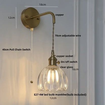 Decorbites glass and copper green flower led wall sconce with antique brass finish and faceted clear glass shade