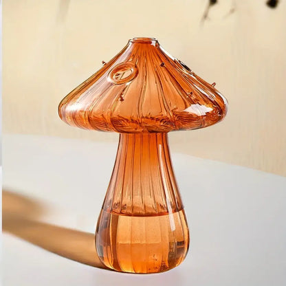 A translucent amber glass mushroom hydroponic planter with vertical ridges and rounded cap for home and garden use