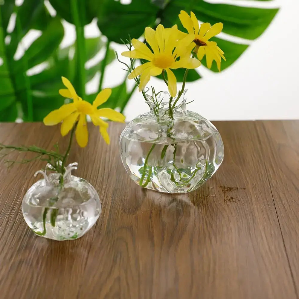 Decorbites™ glass pomegranate flower vase home decor featuring a clear textured glass vase with yellow daisies
