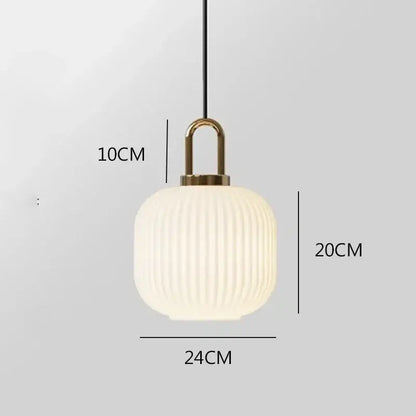 Cream-colored ribbed glass stripe brass pendant light by Decorbites ideal for dining room pendant lights with led option