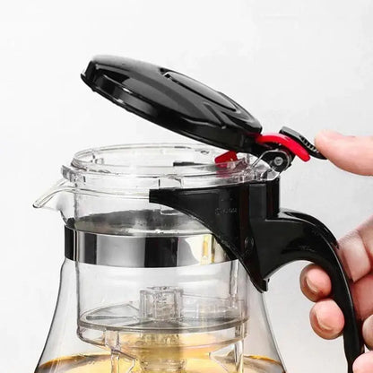 Clear glass tea infuser pot with black lid handle and stainless steel band from decorbites glass tea set 900ml