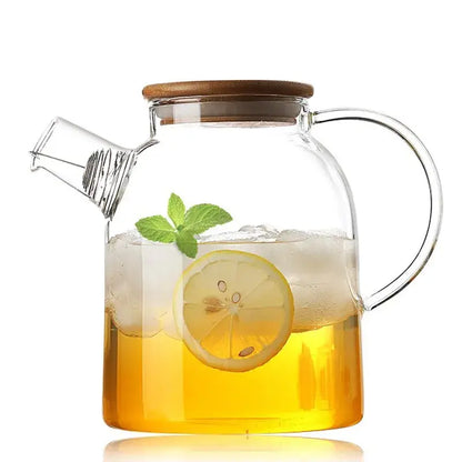DecorBites glass teapot large capacity transparent glass teapot cold with wooden lid filled with iced lemon tea and mint leaves