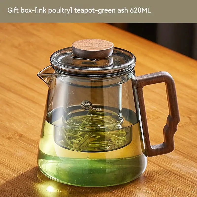 Clear glass decorbites glass teapot with wooden lid and handle featuring internal infuser for steeping green tea leaves