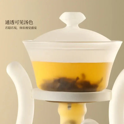 Decorbites glass teapot with magnetic drip pot and base in white translucent glass featuring curved handles and central stem